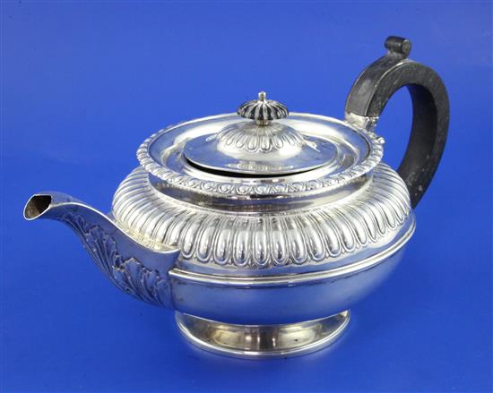 A George IV silver circular teapot, gross 24 oz.